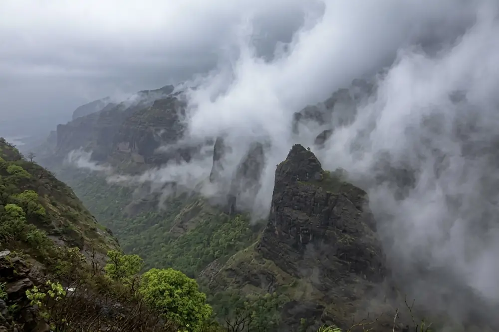 Clouds drifting over forested hills at Ananthagiri